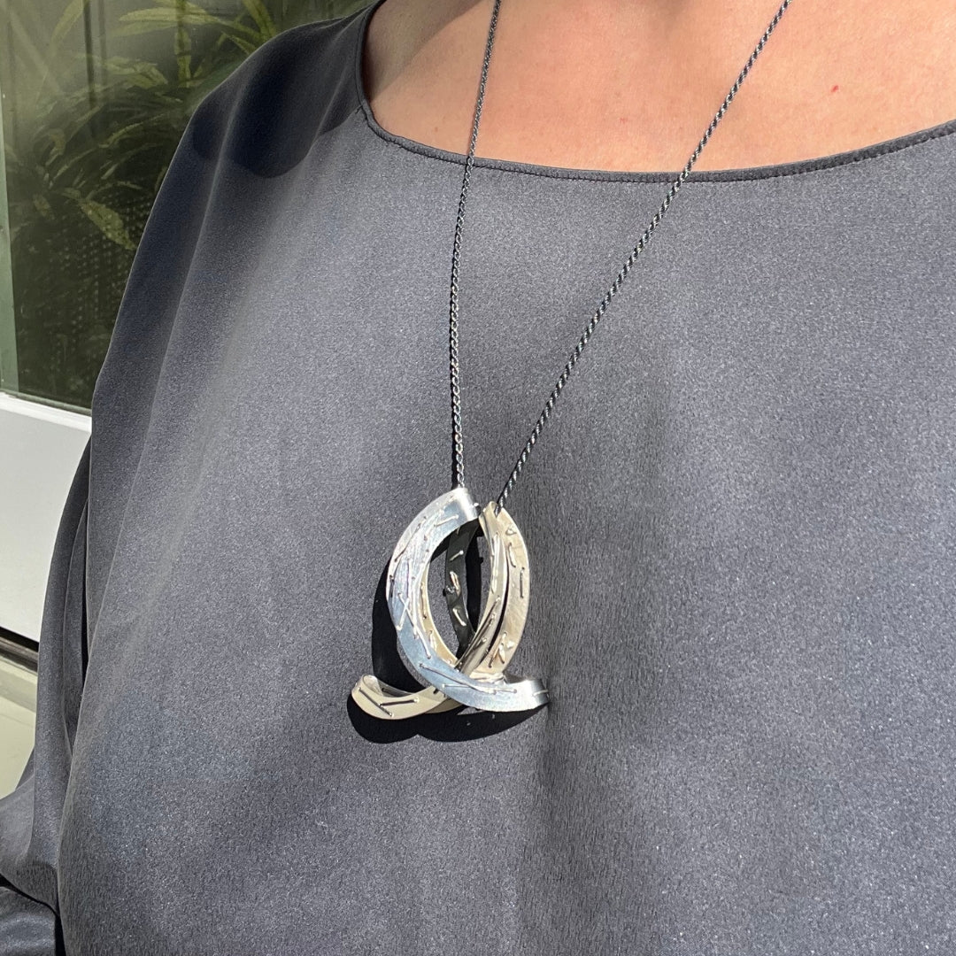 Stitched Arc Pendant Necklace