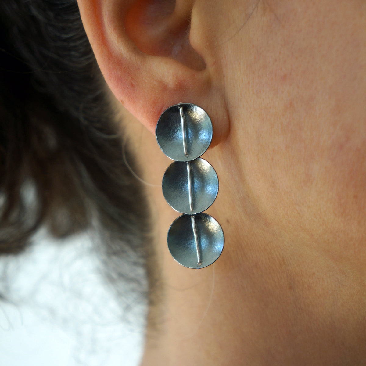 Suzanne Schwartz Wearing Three Circle Earring