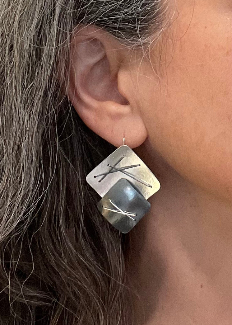 Suzanne Schwartz wearing Double Diamond Layered Earrings