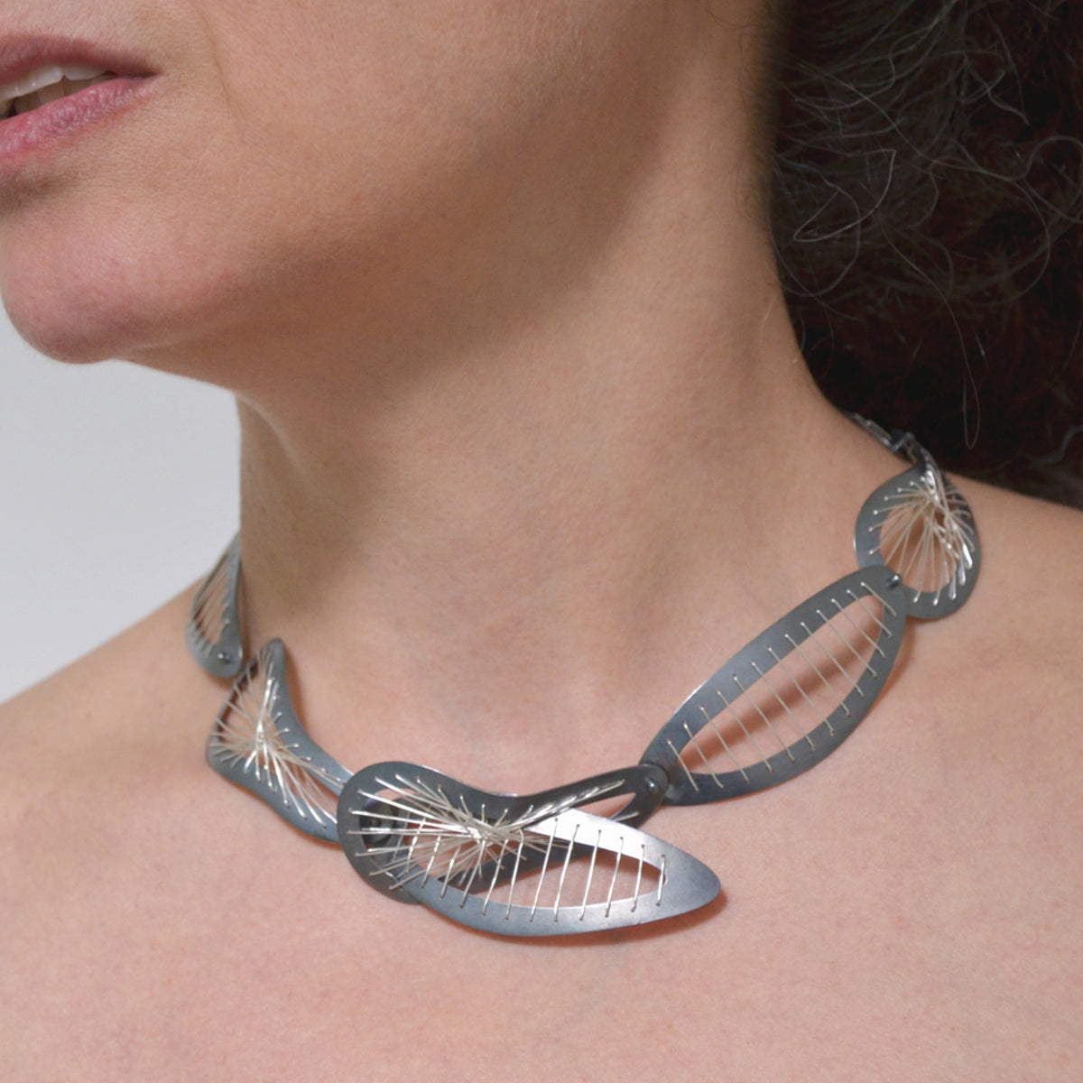 Suzanne Schwartz wearing Sew Weave Necklace