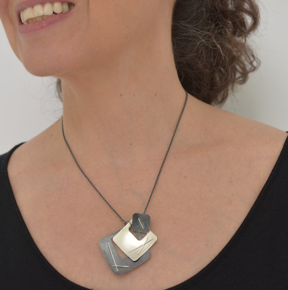 Suzanne Schwartz Wearing Three Square Necklace