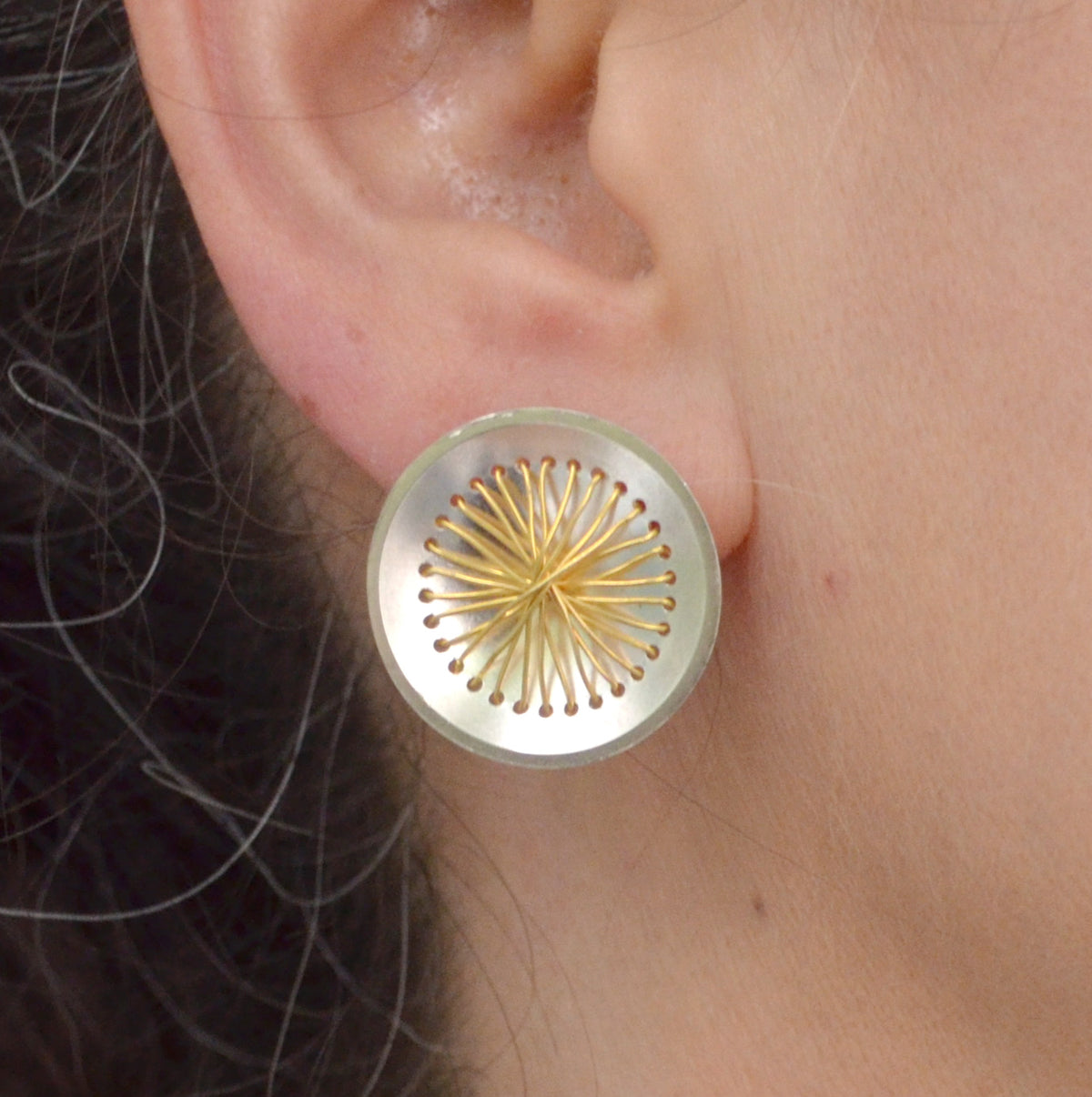 Suzanne Schwartz wearing Circle Sewn Earring