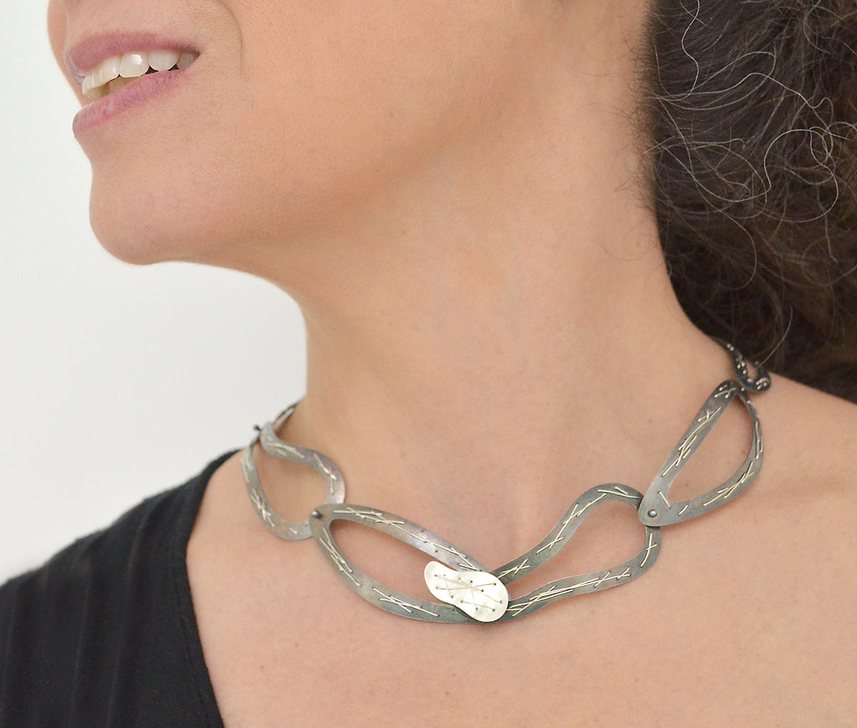 Suzanne Schwartz wearing Stitched Necklace