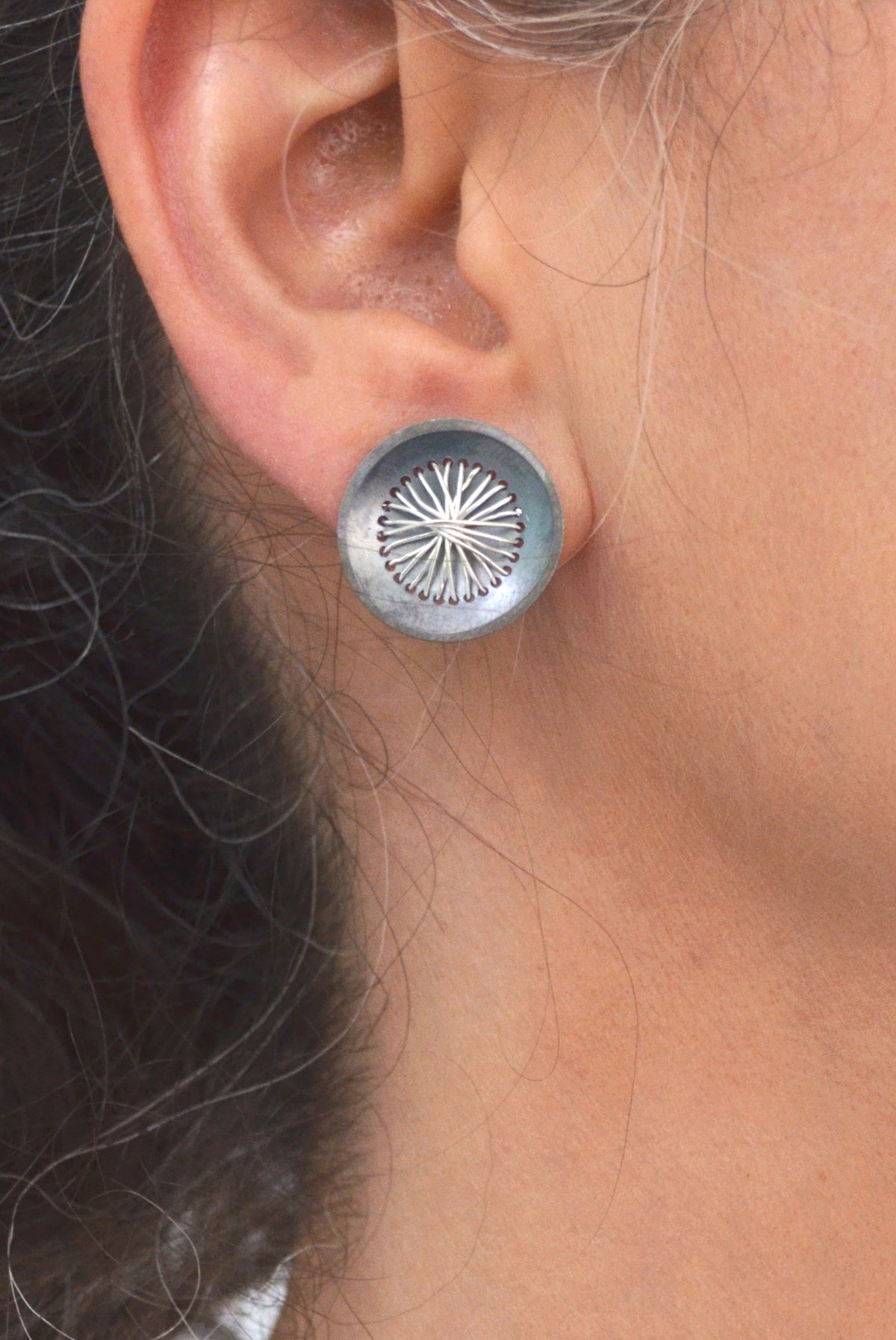 Suzanne Schwartz wearing Circle Sewn Earring