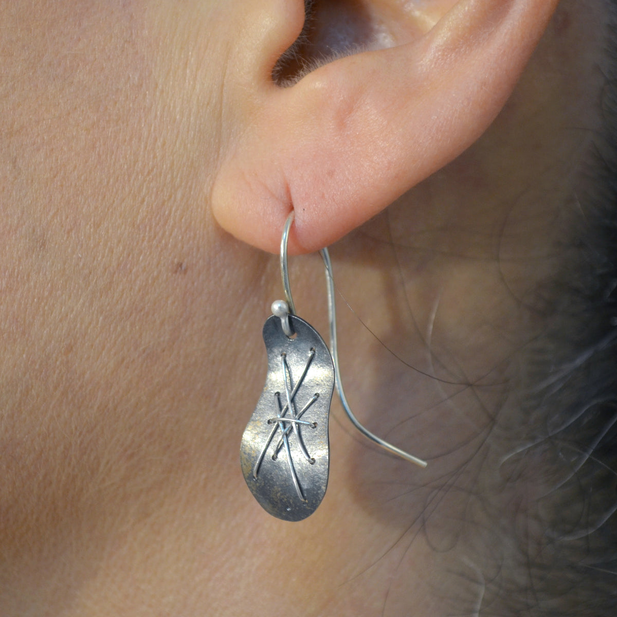 Suzanne Schwartz wearing Cascade Hanging Earrings