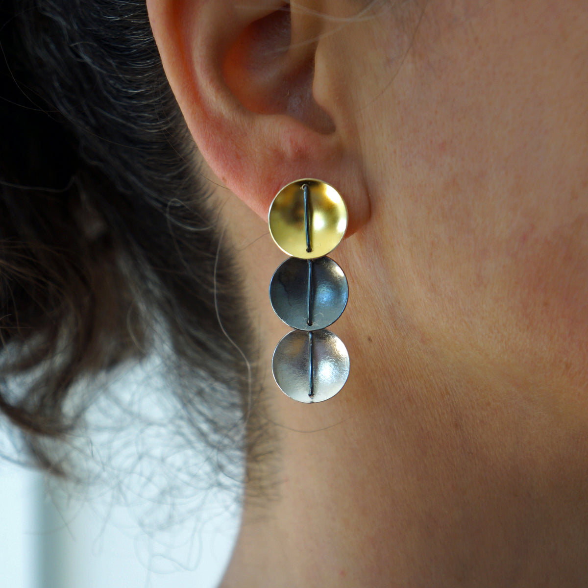 Suzanne Schwartz Wearing Tri Color Circle Earring